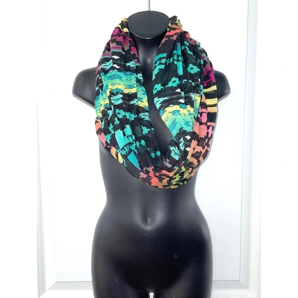 Colorful multicolor infinity scarf featuring a bold abstract/geometric pattern